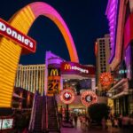 McDonald's on the Las Vegas Strip in Las Vegas, Nevada, surrounded by iconic hotels and casinos.