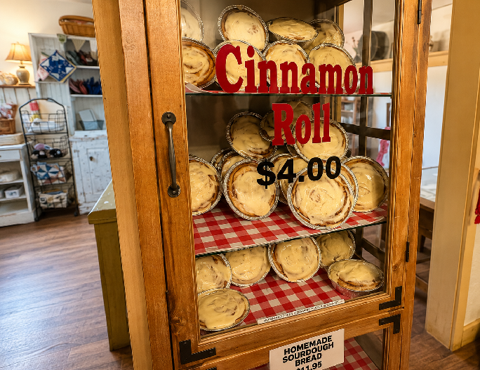 Fresh homemade cinnamon rolls for sale at Gifford Homestead in Capitol Reef National Park, Utah.