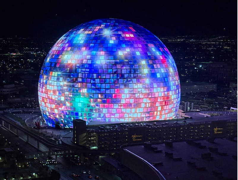 Exterior view of the Las Vegas Sphere illuminated at night